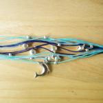 Dolphin In Blue Tone String Bangle - Waxed Cord..